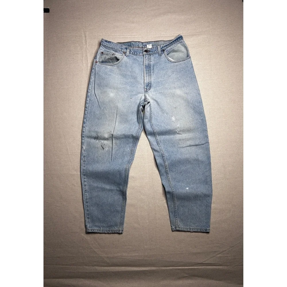Vintage Levi's 560 Jeans Men's 38x30 Loose Fit Tapered Leg Light Wash USA